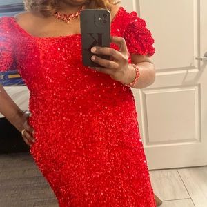 Red sequins evening gown with Demi train